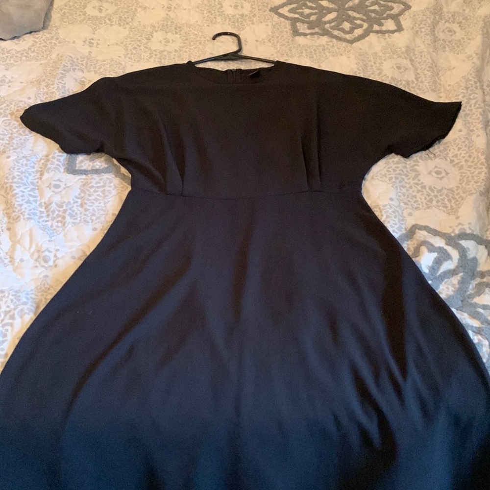 Long black Lacey dress.